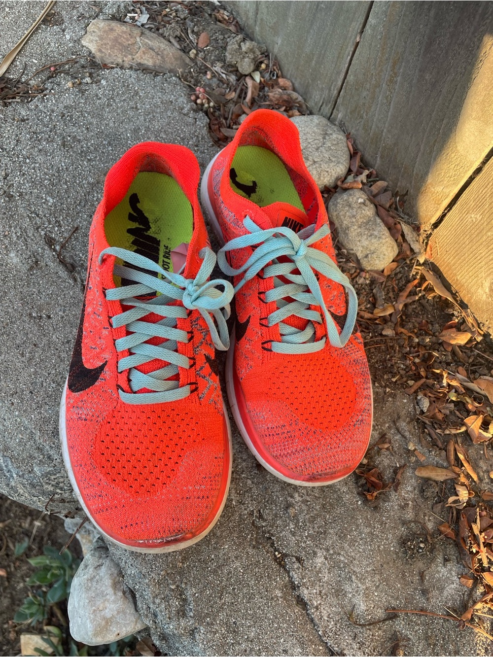 Nike Bright Orange Knit Running Sneakers with Light Blue Laces